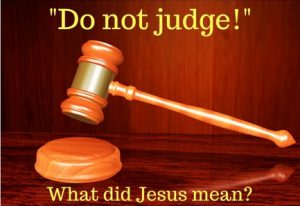 Wooden judge’s gavel with the phrase “Do not judge! What did Jesus mean?”—depicting a biblical teaching on judgment.